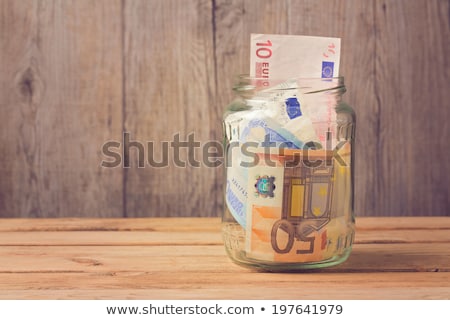 Stock fotó: Euro Banknotes In Jar