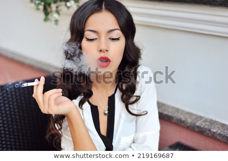 Foto stock: Stylish Woman Smoking