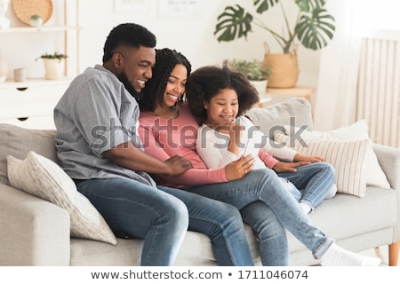 Foto stock: Mother Father And Their Little Daughter