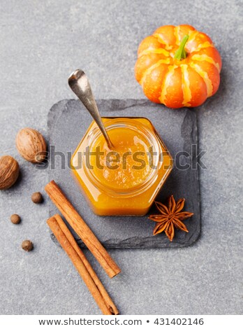 Stock photo: Pumpkin Confiture Jam Sauce With Spices On Stone Table Top View