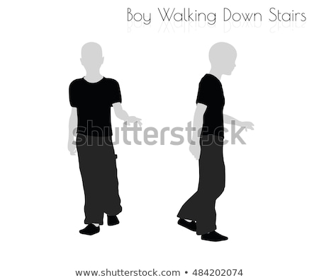 Stock fotó: Boy In Everyday Walking Down Stairs Pose On White Background