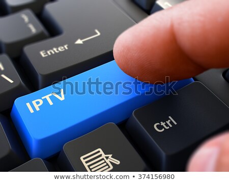 Foto stock: Finger Presses Blue Keyboard Button Iptv