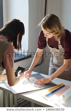 Foto stock: Businesswoman Working With Glass Beads