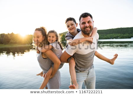 Stock fotó: Family On The Pier Warm Summer Day Having Good Time