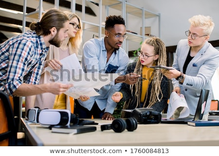 Stock photo: Young Businessteam Working With New Startup Project Discussing