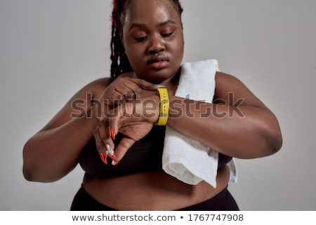 Foto stock: African American Woman Checking Diet Weight Loss