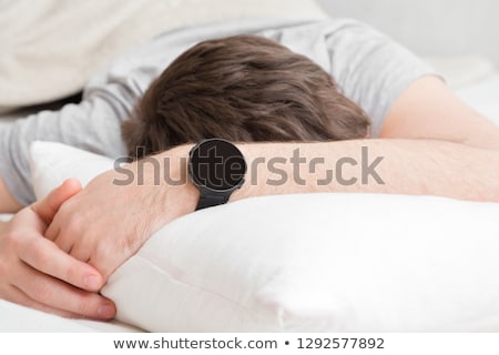 Stockfoto: Man Resting Head Wrist