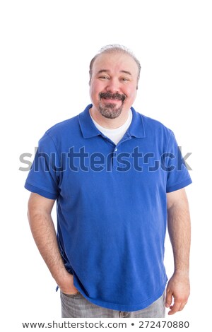 Stock foto: Optimistic Adult Guy In Blue Smiling At The Camera