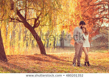 Foto stock: Couple In Autumn Park