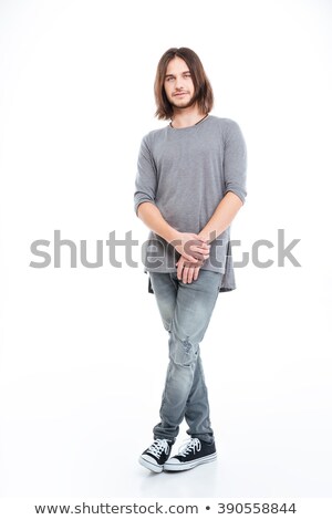 Foto stock: Full Lenght Of Handsome Young Man With Long Hair