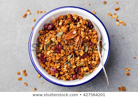 Foto stock: Healthy Breakfast Fresh Granola Muesli With Pumpkin Pecan Nuts Cranberries Copy Space Top View