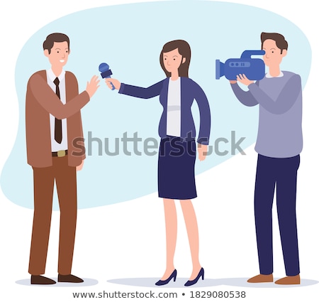 Foto stock: Elegant Female Journalist Conducting Business Interview