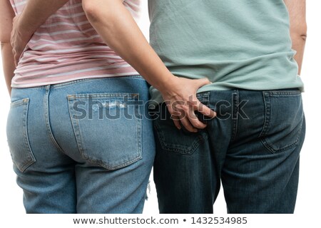 ストックフォト: Man Touching Womans Ass From Back