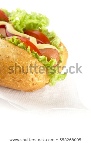 Stockfoto: Cropped Hotdog With Ingredients On Serviette On White Background