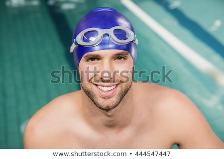 ストックフォト: Handsome Man Wearing Swim Cap And Goggles