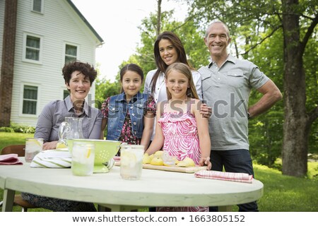 Stock fotó: Mature Woman Making Fresh Lemonade