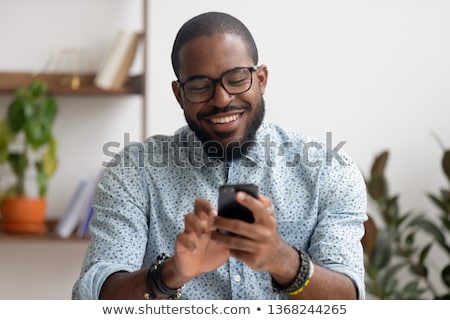 Foto stock: Businessman Using A Cellular Telephone