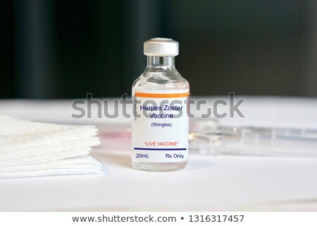 Foto stock: Zoster Vaccine Bottle With Syringe