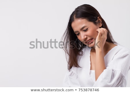 Stok fotoğraf: Woman Scratching Her Neck