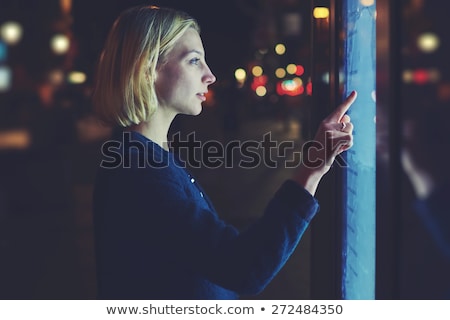 Foto stock: Person Touching Light Blue Hologram Screen