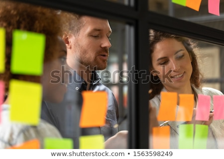 Stok fotoğraf: Man Showing Scrum And Agile Cards
