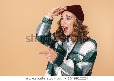 Stockfoto: Photo Of Nice Caucasian Woman Screaming And Pointing Finger Aside