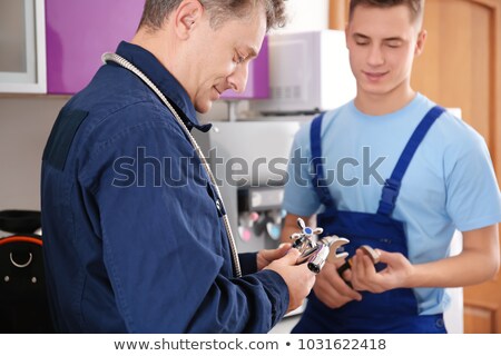 [[stock_photo]]: Young Trainee Plumber