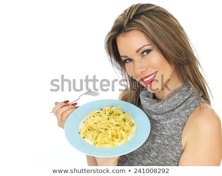 Foto stock: Woman Eating Tagliatelle