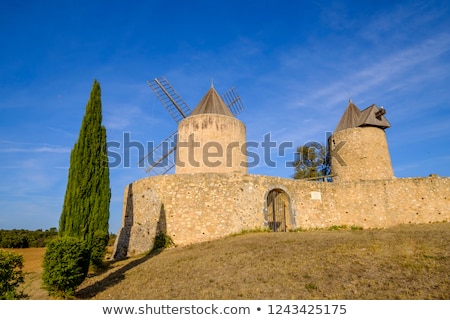 Stock photo: Windmills In Regusse Provence France