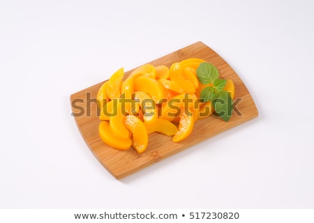 Foto stock: Peeled And Sliced Peaches