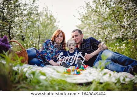 Сток-фото: Smiling Women Picnicking In Orchard
