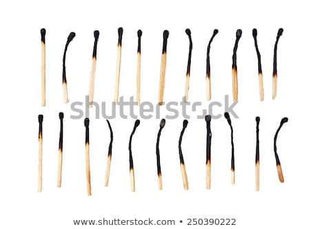 Stockfoto: Burnt Matchsticks On Background In Studio