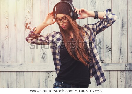 Hipster Girl In Glasses Headphones And Black Beanie Foto d'archivio © doodko