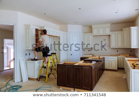 Сток-фото: Installation Of Kitchen Drawer In Cabinet