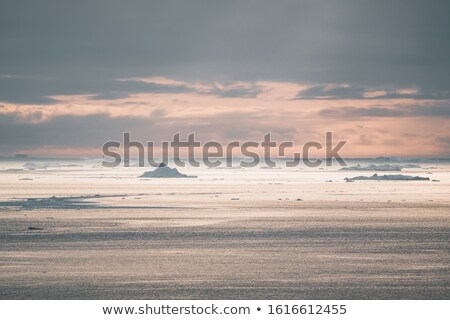 Stock fotó: Icebergs In Arctic Landscape Nature With Travel Tourists In Greenland