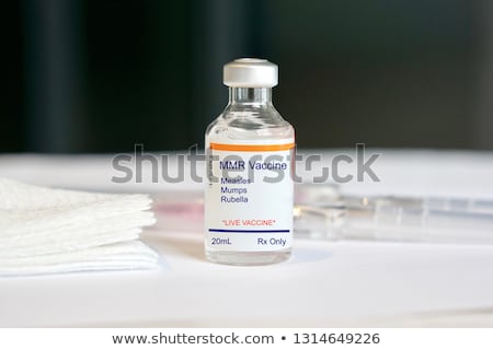 Zdjęcia stock: Measles Mumps Rubella Vaccine Vials With Syringe