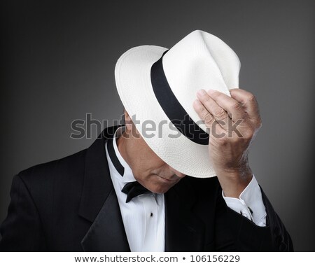 Zdjęcia stock: Man In Tuxedo With Panama Hat