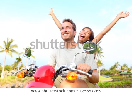 ストックフォト: Free Young Couple On Scooter On Summer Vacation