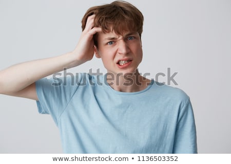 Stockfoto: Handsome Man On Blue Wearing White Shirt And Braces