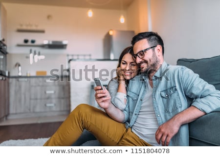 Foto stock: Close Up Of Happy Man With Smartphone At Home