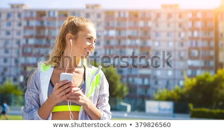 Foto d'archivio: Runners On The Stadium Track Women Summer Fitness Workout