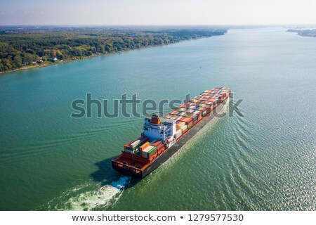 ストックフォト: Containers On Ship In River