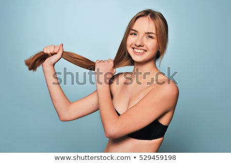 Stockfoto: Girl In Black Bra Showing Their Long Hair