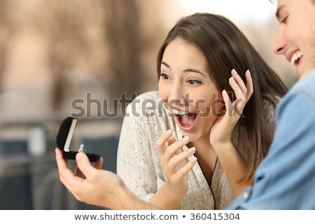 Stock fotó: Man Giving Woman Engagement Ring At Restaurant