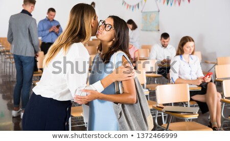 Stockfoto: Portrait Of Two Women In The Hall