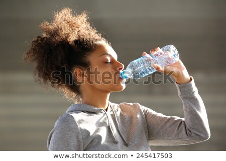 Сток-фото: Beautiful Healthy Black Girl With Bottled Water