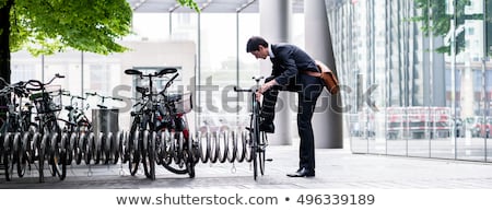 Businessman By Bicycle Rack Foto d'archivio © Kzenon