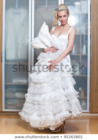 Stock foto: Young Pretty Blond Woman Wearing Wedding Dress Indoors