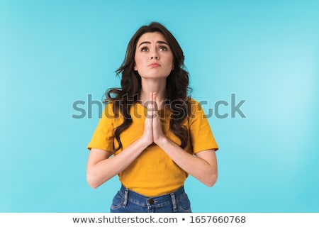 Foto stock: Nervous Pretty Woman Posing Isolated Over Blue Wall Background Showing Hopeful Gesture