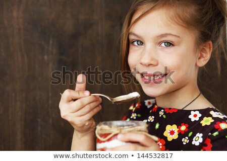 Stock photo: Enjoying Delicious Yogurt